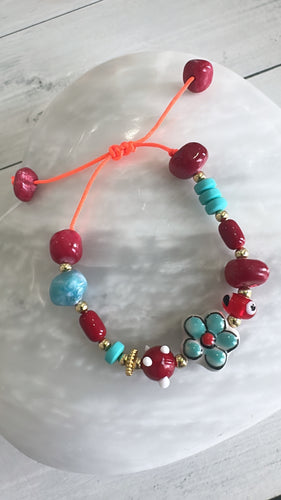 Flower & eye bracelet