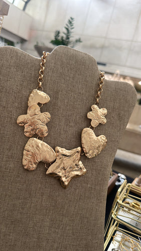 Star, flower & heart necklace