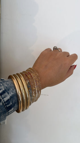 Set clear & gold bracelets