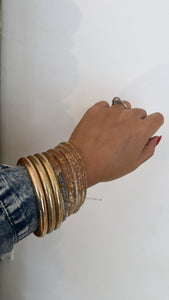 Set clear & gold bracelets